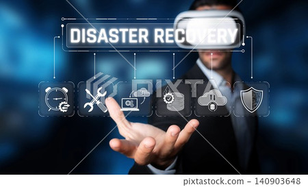 A businessman engages with virtual reality technology illustrating disaster recovery solutions, emphasizing strategic planning and modern digital resource management. Sigmoid 140903648