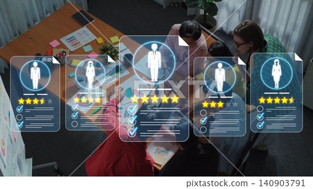 A group of professionals engages in teamwork, analyzing digital profiles with ratings and feedback to enhance performance in a modern office environment. Sigmoid A group of professionals engages in teamwork, analyzing digital profiles with ratings and feedback to enhance performance in a modern office environment. Sigmoid 140903791
