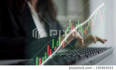 Professional businesswoman analyzing financial data on computer with stock market growth chart overlay representing successful investment strategies and trends Copula 140904033