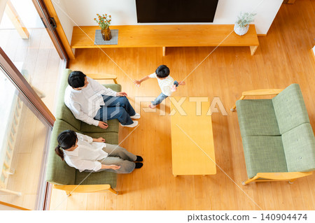 A 6-year-old boy runs to his parents. A 6-year-old boy runs to his parents. 140904474