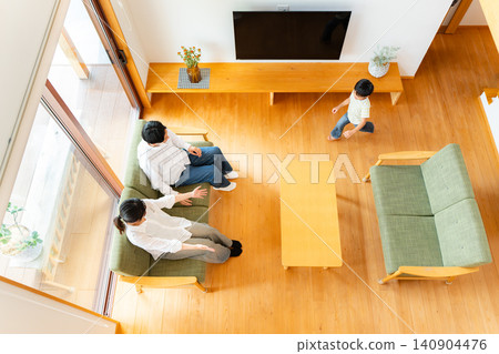 A 6-year-old boy runs to his parents. A 6-year-old boy runs to his parents. 140904476