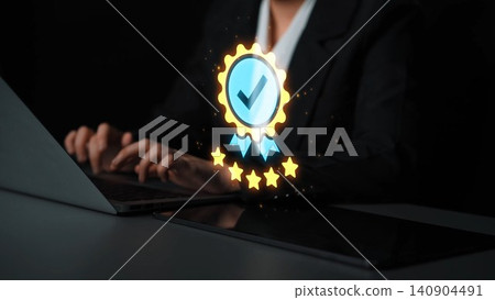 Professional Business Person Working on Laptop with Digital Quality Badge and Stars Symbolizing Trust and Excellence in Service and Performance Enhancement Gluon Professional Business Person Working on Laptop with Digital Quality Badge and Stars Symbolizing Trust and Excellence in Service and Performance Enhancement Gluon 140904491