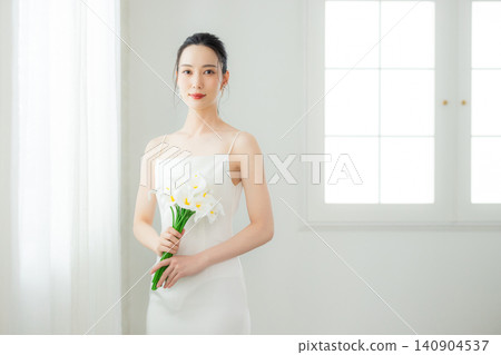 Bride with a bouquet Bride with a bouquet 140904537
