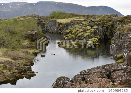 Silfra Fissure filled with glacial water between tectonic plates Silfra Fissure filled with glacial water between tectonic plates 140904985