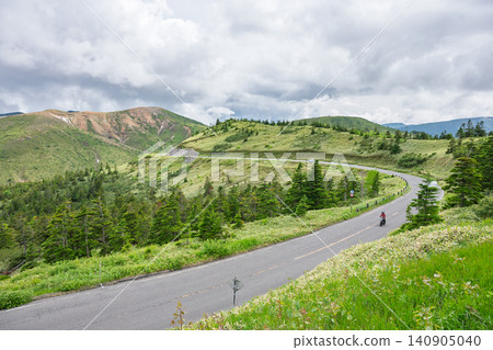 Motorcycle touring on a mountain pass (National Route 292, Nagano Prefecture) Motorcycle touring on a mountain pass (National Route 292, Nagano Prefecture) 140905040