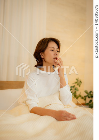woman looking at smartphone at night 140905078