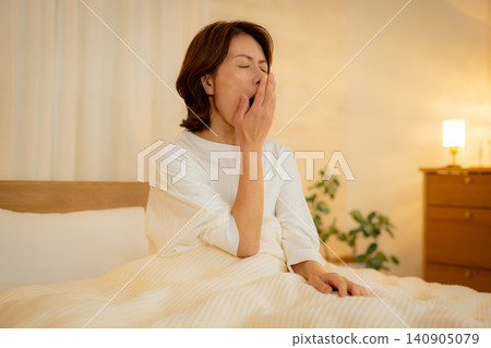 woman looking at smartphone at night 140905079