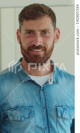 Vertical Video Portrait of man who is ready for housework. 140905384