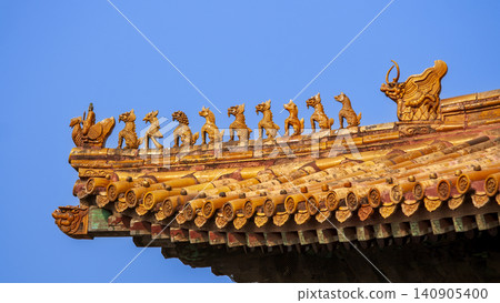 Yellow glazed ridge ornaments on the eaves of Hall of Supreme Harmony, Forbidden City, Beijing, China 140905400