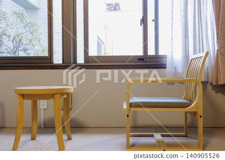 A window-side rest area on the veranda of a Japanese-style hotel. A window-side rest area on the veranda of a Japanese-style hotel. 140905526