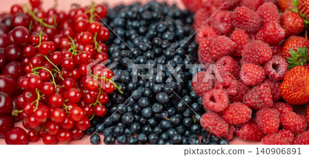 Mix of different ripe tasty berries as background 140906891