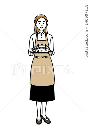 一位在蛋糕店工作的年輕女子 一位在蛋糕店工作的年輕女子 140907119