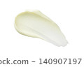 Creamy cosmetic smear of vitamin C face cream, serum or body cream butter isolated on white background. Skincare texture and moisturizing beauty product sample for design. 140907197