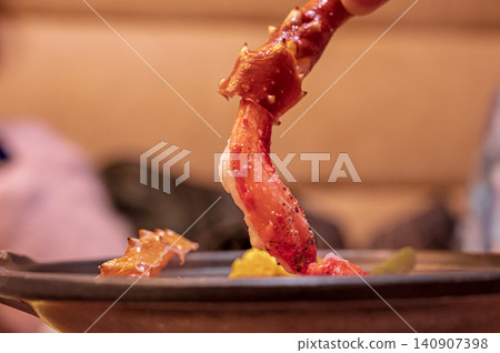 The king crab legs that were lifted up The king crab legs that were lifted up 140907398