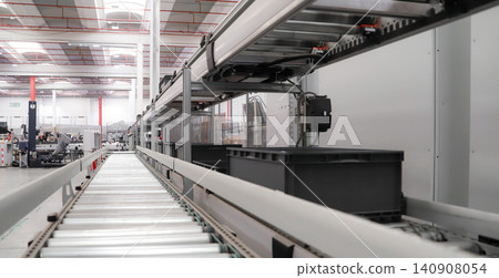 packing line in a logistics warehouse. conveyor belt in a modern production line. Pallet racking packing line in a logistics warehouse. conveyor belt in a modern production line. Pallet racking 140908054