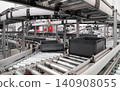 packing line in a logistics warehouse. conveyor belt in a modern production line. Pallet racking 140908055