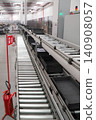 packing line in a logistics warehouse. conveyor belt in a modern production line. Pallet racking 140908057