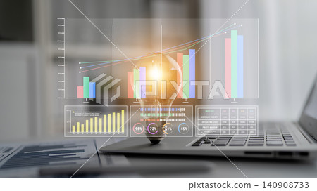Business Innovation Concept with Light Bulb, Bar Graphs, and Digital Data Visualization on Laptop for Creative Problem Solving in Modern Workplace Fluxor Business Innovation Concept with Light Bulb, Bar Graphs, and Digital Data Visualization on Laptop for Creative Problem Solving in Modern Workplace Fluxor 140908733