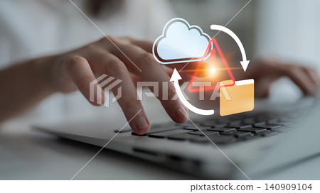 Hand using laptop with cloud storage symbol and folder icon representing data synchronization and file management in digital technology environment Gantry Hand using laptop with cloud storage symbol and folder icon representing data synchronization and file management in digital technology environment Gantry 140909104