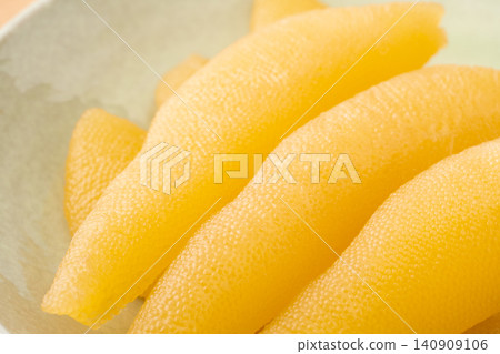 Close-up of seasoned herring roe on a plate Close-up of seasoned herring roe on a plate 140909106