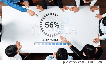 Team Collaboration in a Modern Office Setting with a Progress Update Displayed on a Table for Project Management and Workflow Improvement. Entropy Team Collaboration in a Modern Office Setting with a Progress Update Displayed on a Table for Project Management and Workflow Improvement. Entropy 140909288