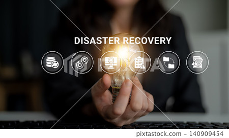 Businesswoman Holding Light Bulb Representing Innovation in Disaster Recovery Planning with Infographic Icons in the Background Ledger Businesswoman Holding Light Bulb Representing Innovation in Disaster Recovery Planning with Infographic Icons in the Background Ledger 140909454