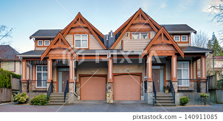 Craftsman Style Duplex Townhouse with Separate Garages and Paved Driveway Craftsman Style Duplex Townhouse with Separate Garages and Paved Driveway 140911085