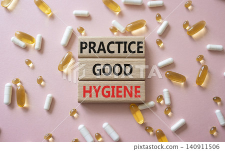 PRACTICE GOOD HYGIENE symbol. Concept words PRACTICE GOOD HYGIENE on wooden blocks. Beautiful pink background with pills. Healthcare and PRACTICE GOOD HYGIENE concept. Copy space. PRACTICE GOOD HYGIENE symbol. Concept words PRACTICE GOOD HYGIENE on wooden blocks. Beautiful pink background with pills. Healthcare and PRACTICE GOOD HYGIENE concept. Copy space. 140911506