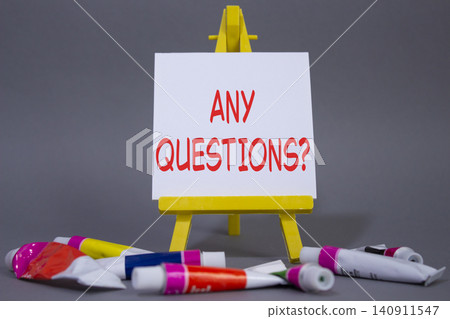 Any Questions symbol. Wooden blocks with words Any Questions . Beautiful grey background with paints and easel. Business and Any Questions concept. Copy space. Any Questions symbol. Wooden blocks with words Any Questions . Beautiful grey background with paints and easel. Business and Any Questions concept. Copy space. 140911547