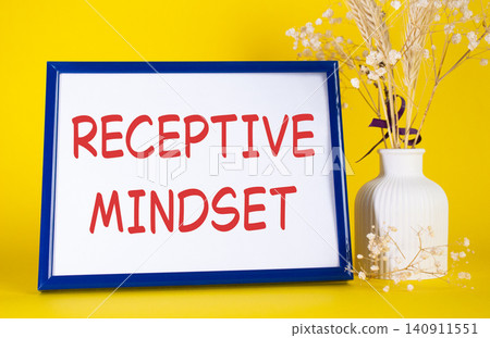 Receptive Mindset symbol. Concept words Receptive Mindset on beautiful wooden picture frame. Beautiful yellow background with flower vase. Business and Receptive Mindset concept. Copy space. Receptive Mindset symbol. Concept words Receptive Mindset on beautiful wooden picture frame. Beautiful yellow background with flower vase. Business and Receptive Mindset concept. Copy space. 140911551