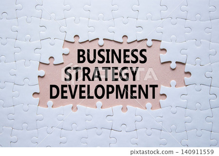 Business Strategy Development symbol. White puzzle with words Business Strategy Development. Beautiful pink background. Business concept. Copy space. Business Strategy Development symbol. White puzzle with words Business Strategy Development. Beautiful pink background. Business concept. Copy space. 140911559