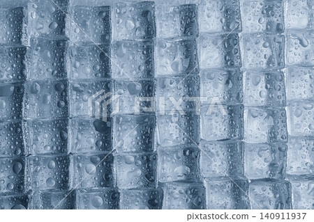 Crystal clear ice cubes with water drops as background, top view Crystal clear ice cubes with water drops as background, top view 140911937