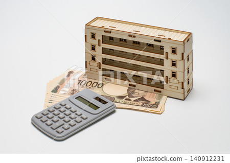 A model of an apartment building, a calculator, and a 10,000 yen bill, representing the funds needed to purchase an apartment or a mortgage, and symbolizing asset building. A model of an apartment building, a calculator, and a 10,000 yen bill, representing the funds needed to purchase an apartment or a mortgage, and symbolizing asset building. 140912231
