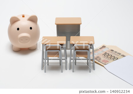 A piggy bank shaped like a pig, a school desk, and cash, symbolizing saving for educational expenses or tuition fees. A piggy bank shaped like a pig, a school desk, and cash, symbolizing saving for educational expenses or tuition fees. 140912234