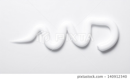 A white cosmetic cream with a wavy texture, set against a minimalist background for skincare products. A white cosmetic cream with a wavy texture, set against a minimalist background for skincare products. 140912340