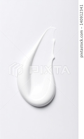 A texture resembling a white cosmetic cream spread in a teardrop shape, with a minimalist background for skincare products. A texture resembling a white cosmetic cream spread in a teardrop shape, with a minimalist background for skincare products. 140912341