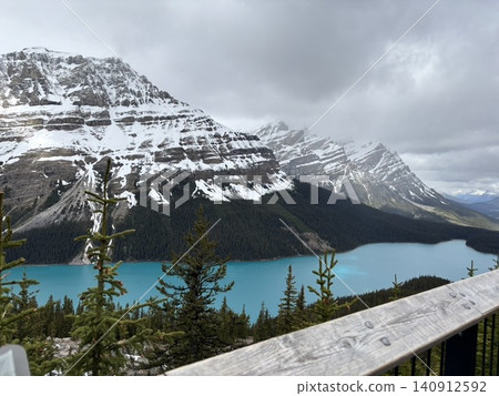 The emerald green Peyto Lake and the Canadian Rockies viewed from the observation deck. The emerald green Peyto Lake and the Canadian Rockies viewed from the observation deck. 140912592