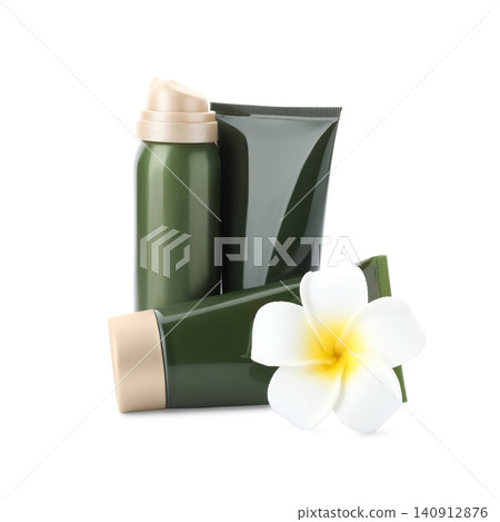 Cosmetic products and tropical flower isolated on white Cosmetic products and tropical flower isolated on white 140912876