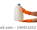 large white plastic canister in hands in protective orange gloves 140913252