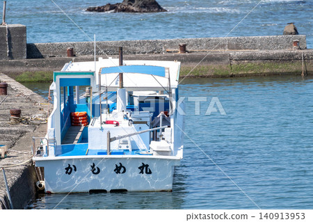 Small fishing boats moored in the harbor Small fishing boats moored in the harbor 140913953