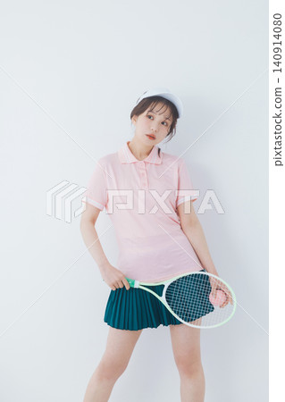 young woman in tennis attire young woman in tennis attire 140914080