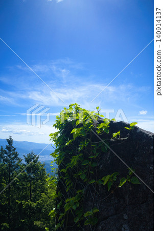 A spectacular view from the observation rock at the summit of Mt. Kasagi in Ena City, Gifu Prefecture. A spectacular view from the observation rock at the summit of Mt. Kasagi in Ena City, Gifu Prefecture. 140914137
