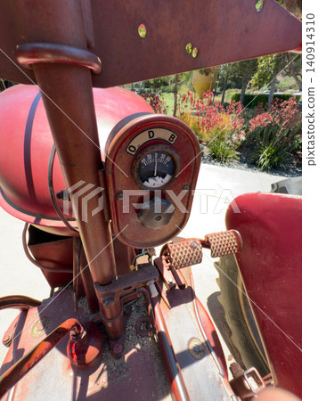 Vintage red tractor, vehicle Machine that reflects agricultural history Vintage red tractor, vehicle Machine that reflects agricultural history 140914310