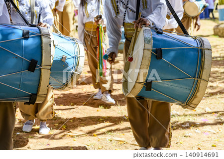 Group of people parading with their drums Group of people parading with their drums 140914691