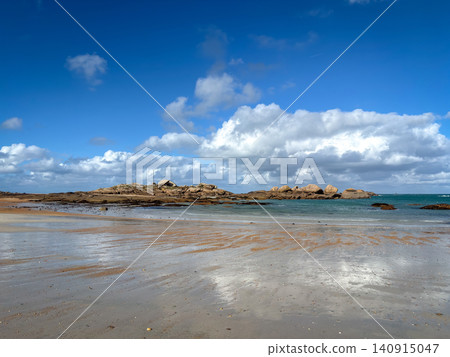 Granite reefs and shallow water along Tregastel Brittany France beach Granite reefs and shallow water along Tregastel Brittany France beach 140915047