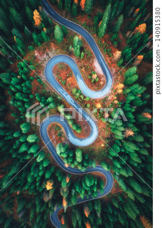 Aerial drone view of winding serpentine road in Dolomites, Italy Aerial drone view of winding serpentine road in Dolomites, Italy 140915380