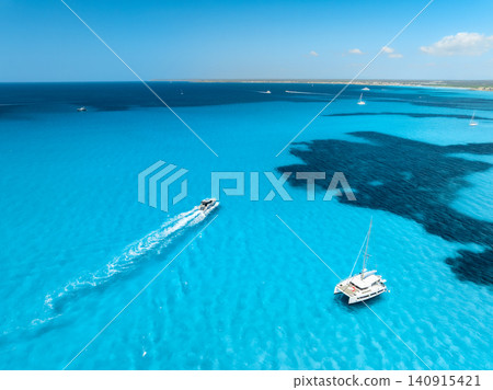 Aerial drone view of floating luxury yachts in blue sea. Boat 140915421
