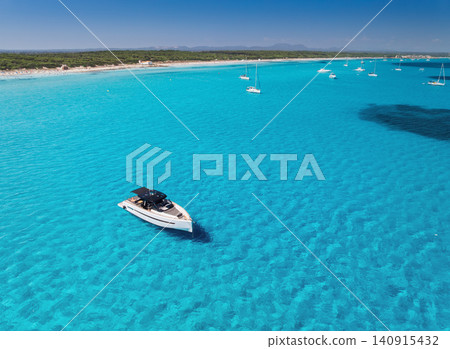 Luxury yacht in crystal clear turquoise sea, aerial drone view 140915432