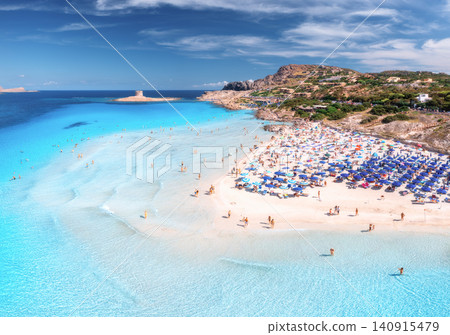 Aerial drone view of La Pelosa sandy beach and blue sea in summer Aerial drone view of La Pelosa sandy beach and blue sea in summer 140915479