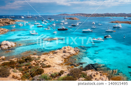 Aerial view of luxury yachts and boats on blue sea, island Aerial view of luxury yachts and boats on blue sea, island 140915495